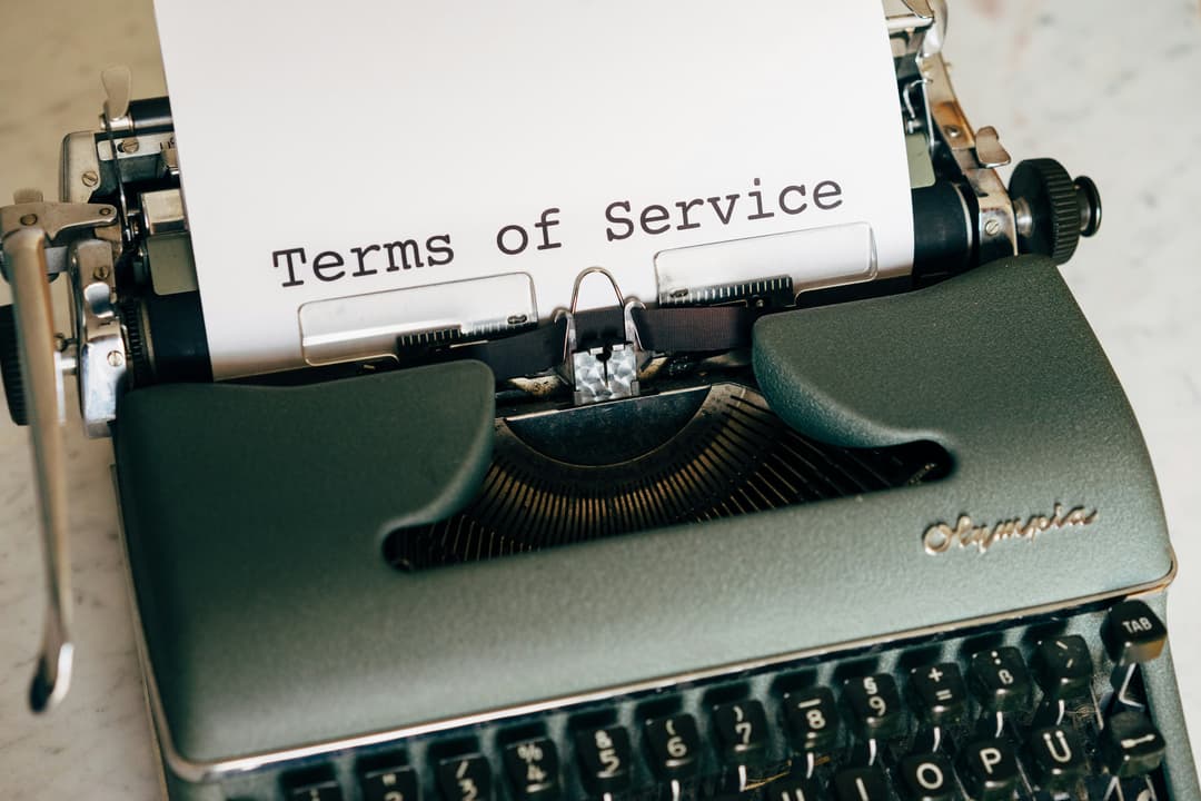 A document with a pen, signifying legal terms